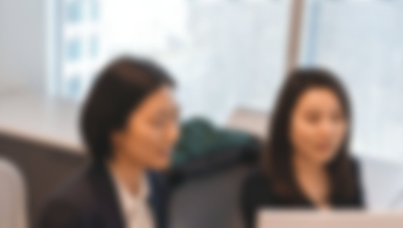 A thumbnail showcasing two Potomac Analytics employees working together on a computer.
